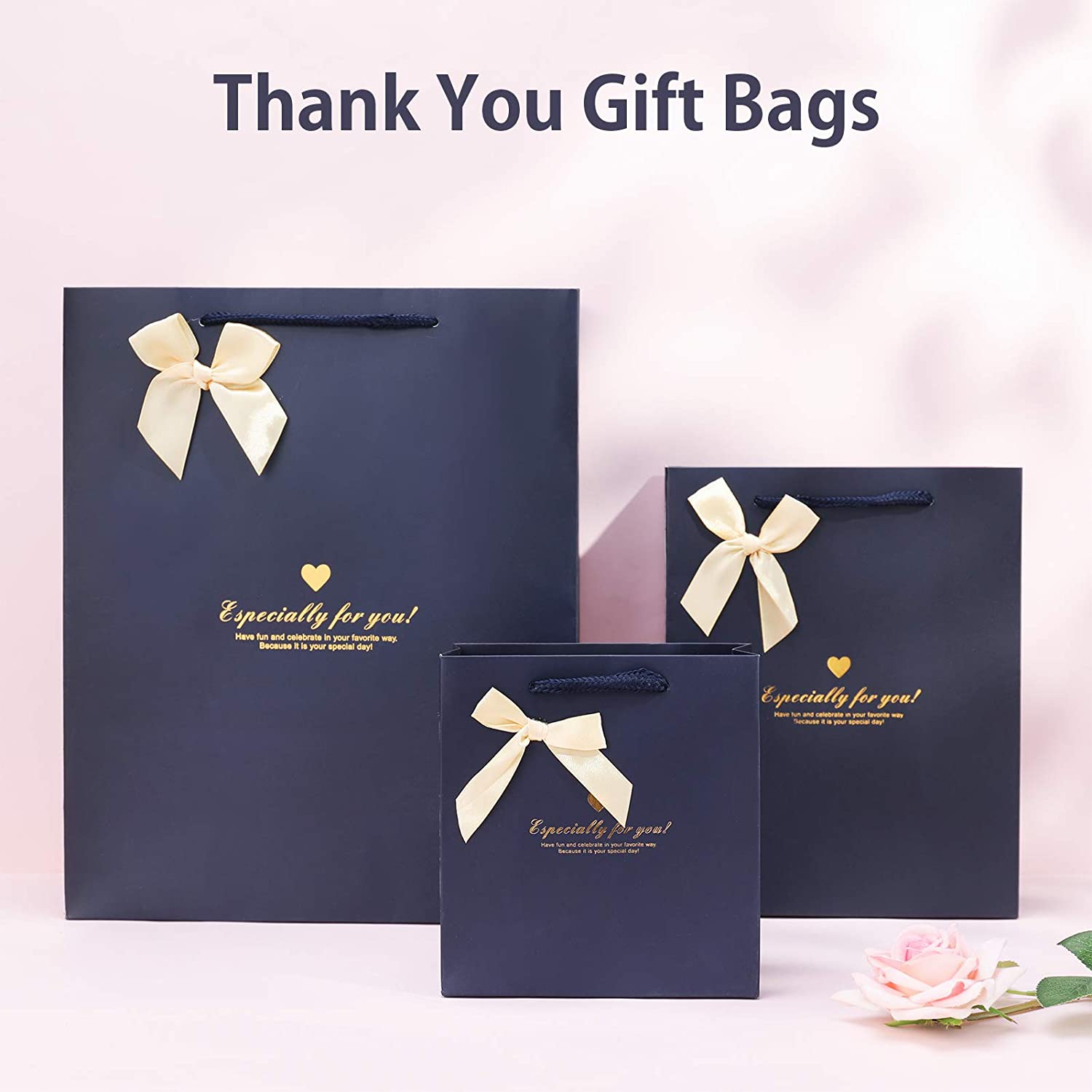 فاخر مخصص شعار أزرق مطبوعة كيس ورق من الورق المقوى مع مقبض bowknot الشريط لصناديق التسوق الهدايا